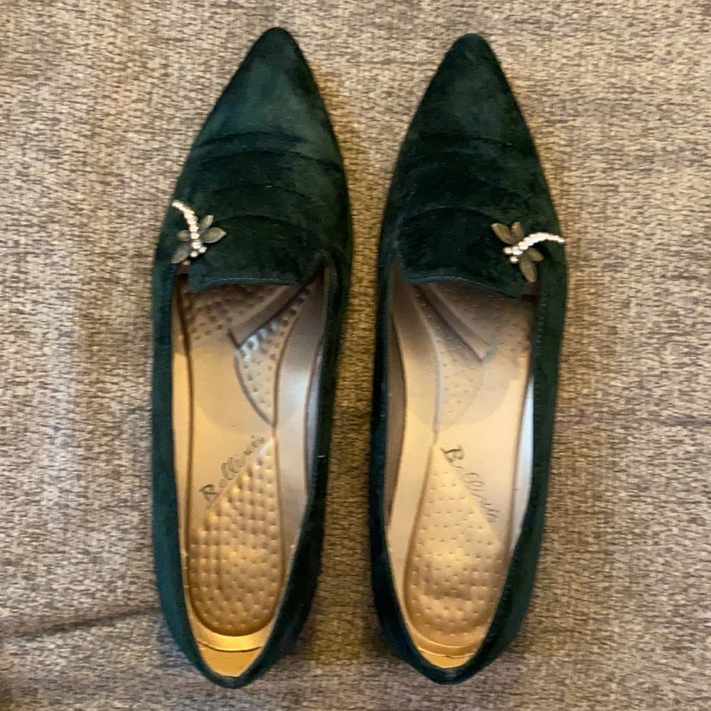 Deep Green loafers with dragonfly embellishments.